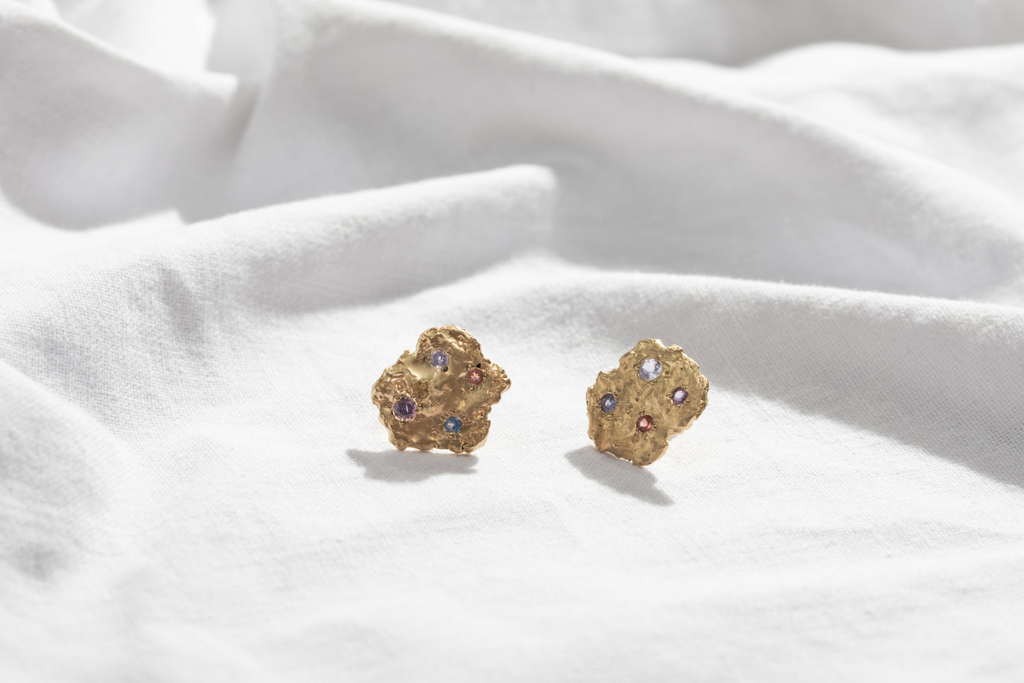 
                  
                    Sapphire Schnitzel Earrings
                  
                